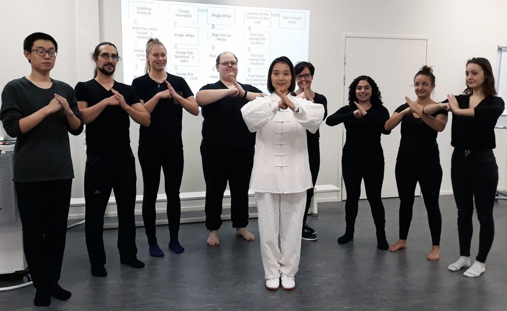 Tai chi group greets with respect