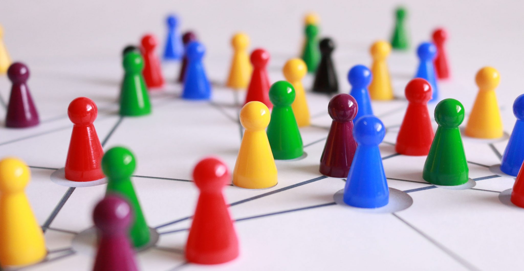 Close Up Photography Of Yellow Green Red And Brown Plastic Figures