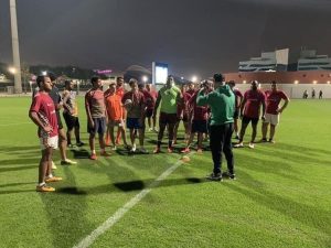 Drew coaching a rugby team in Qatar.