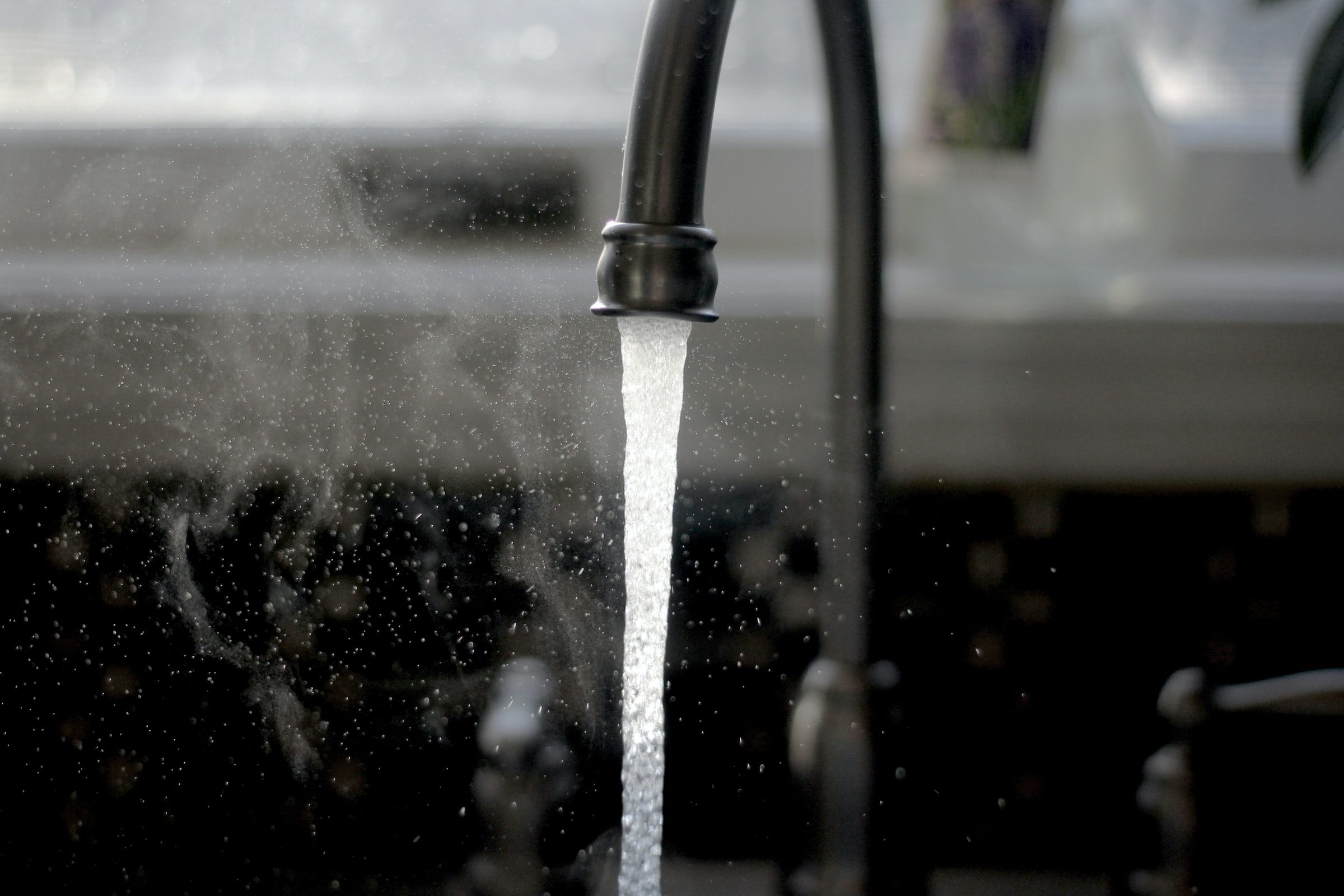 Close-up of a tap with water running out of it.