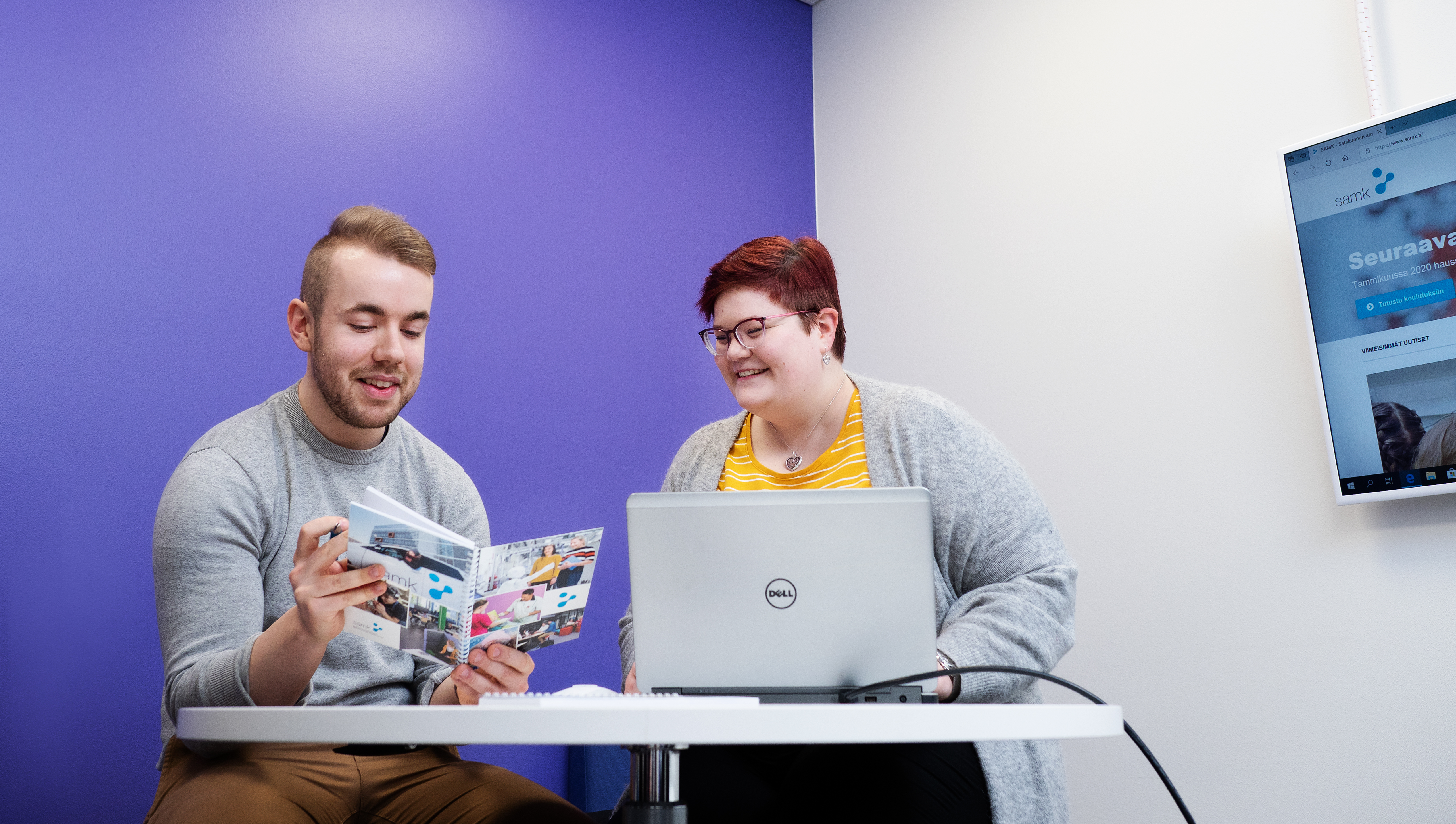 Two people studying.
