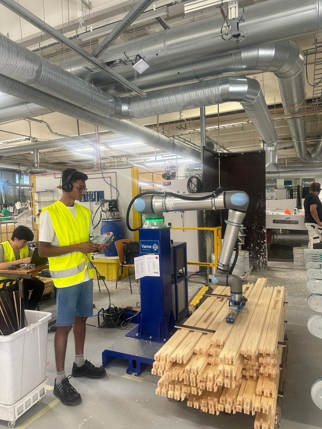 Ganesh commissioning a robot at the Pihla factory